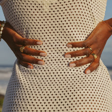 Load image into Gallery viewer, model waarin a beach dress with golden rings