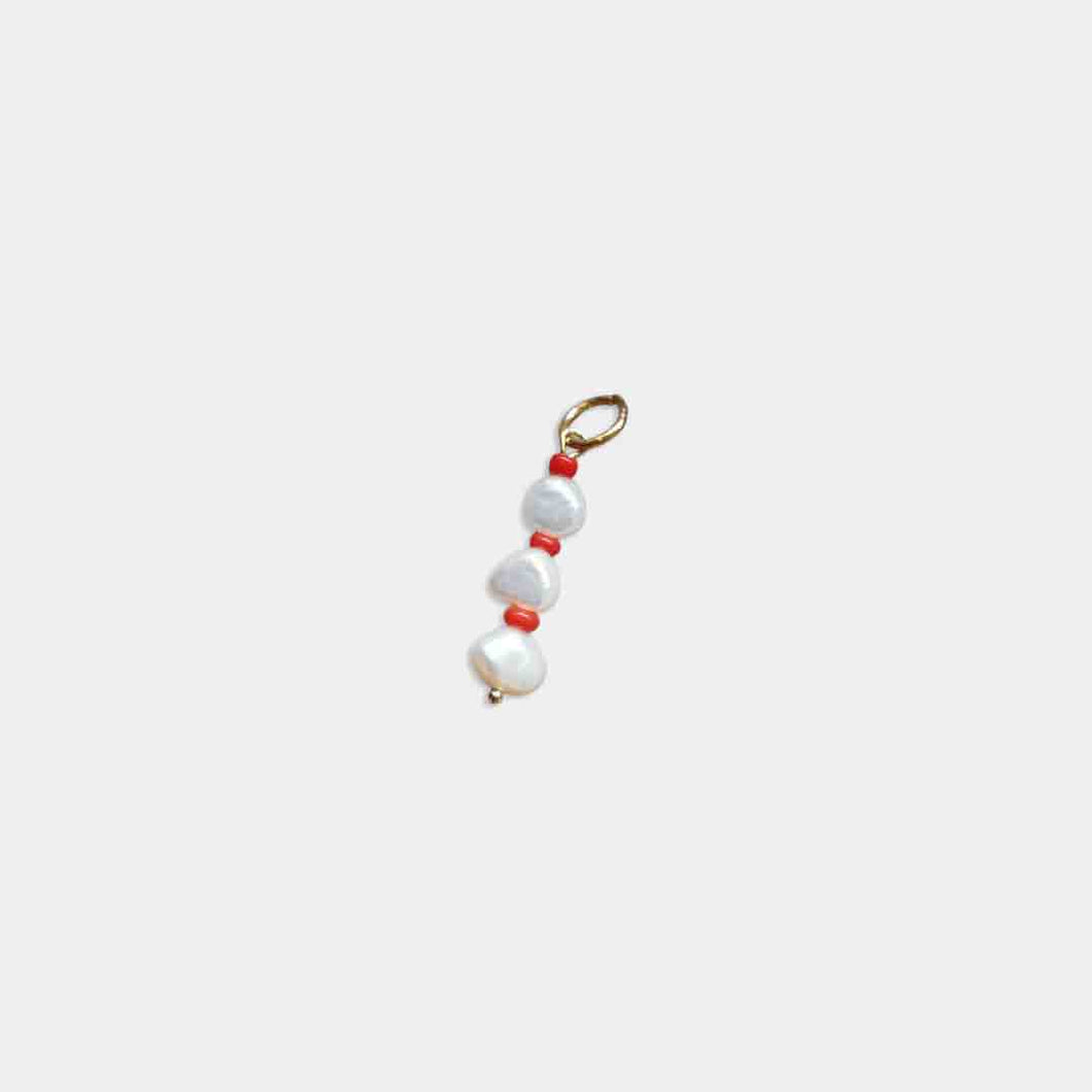 Coral pearl charm